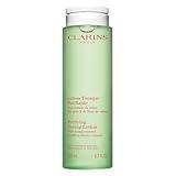 Clarins Purifying Toning Lotion | Less Oily Skin After 14 Days of Use* | Cleanses, Hydrates, Purifies, Mattifies and Balances Skin's Microbiota | Contains Witch Hazel | Combination To Oily Skin Types