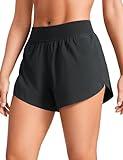 CRZ YOGA Mid Waisted Dolphin Athletic Shorts for Women 4" Lightweight High Split for Gym Workout with Liner Quick Dry Black Medium